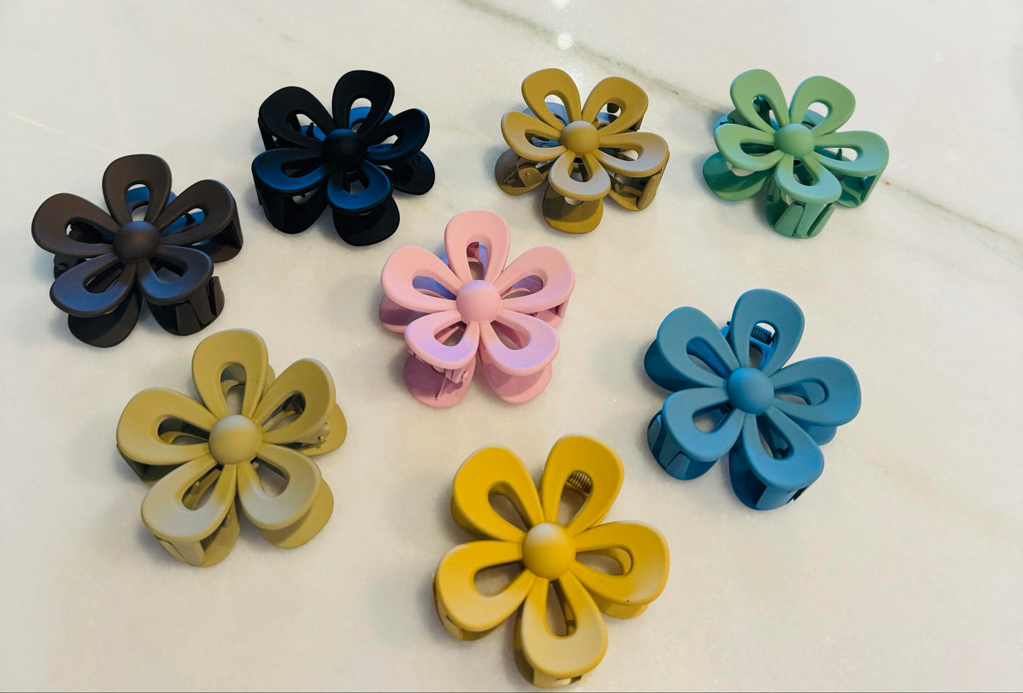 Assorted colored flower hair clips